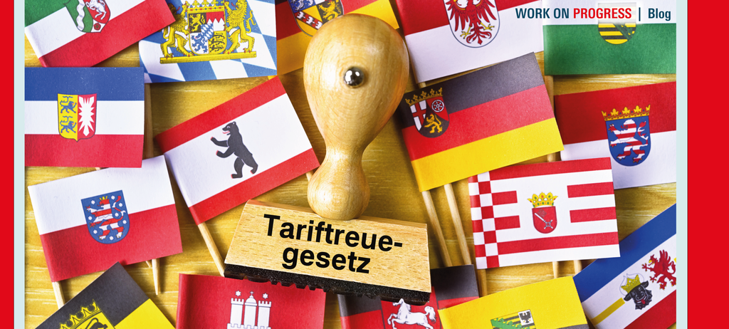 Fähnchen der Bundesländer und ein Stempel Tariftreue